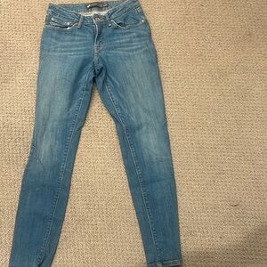 Bold curve mid rise skinny size 4/27
